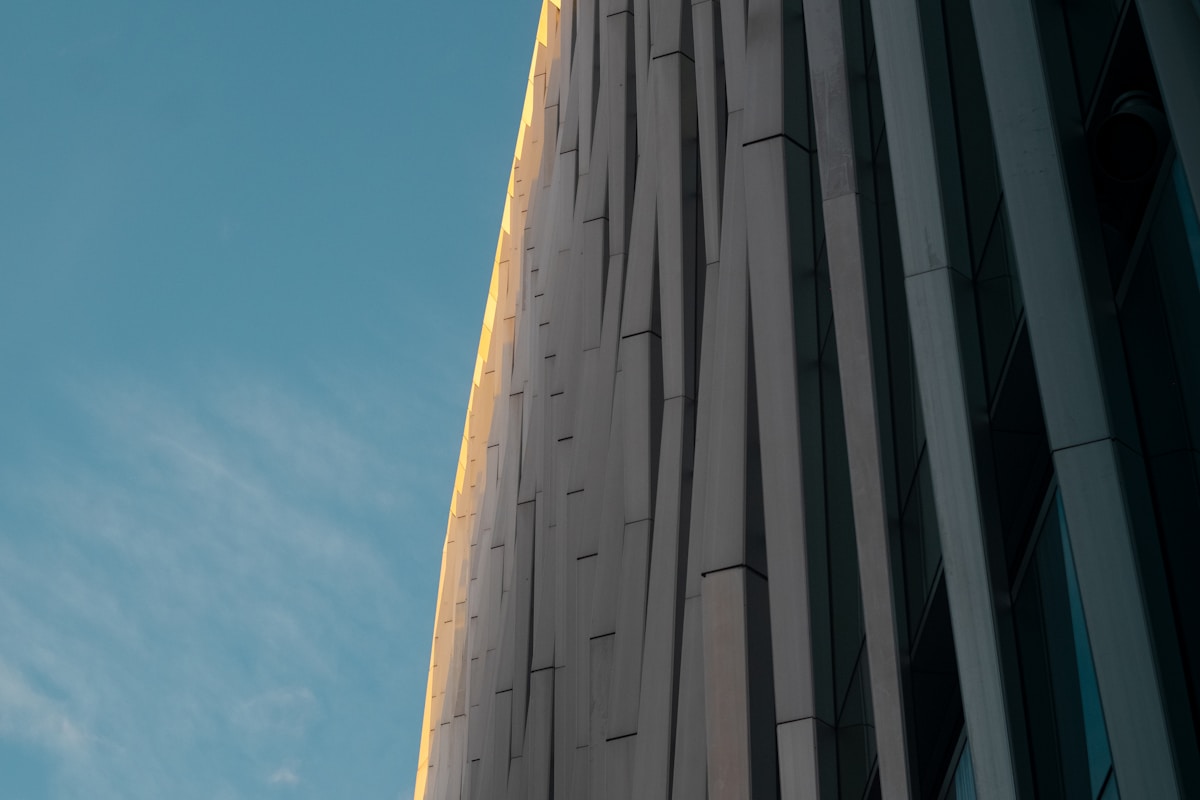 a tall building with a clock on the side of it