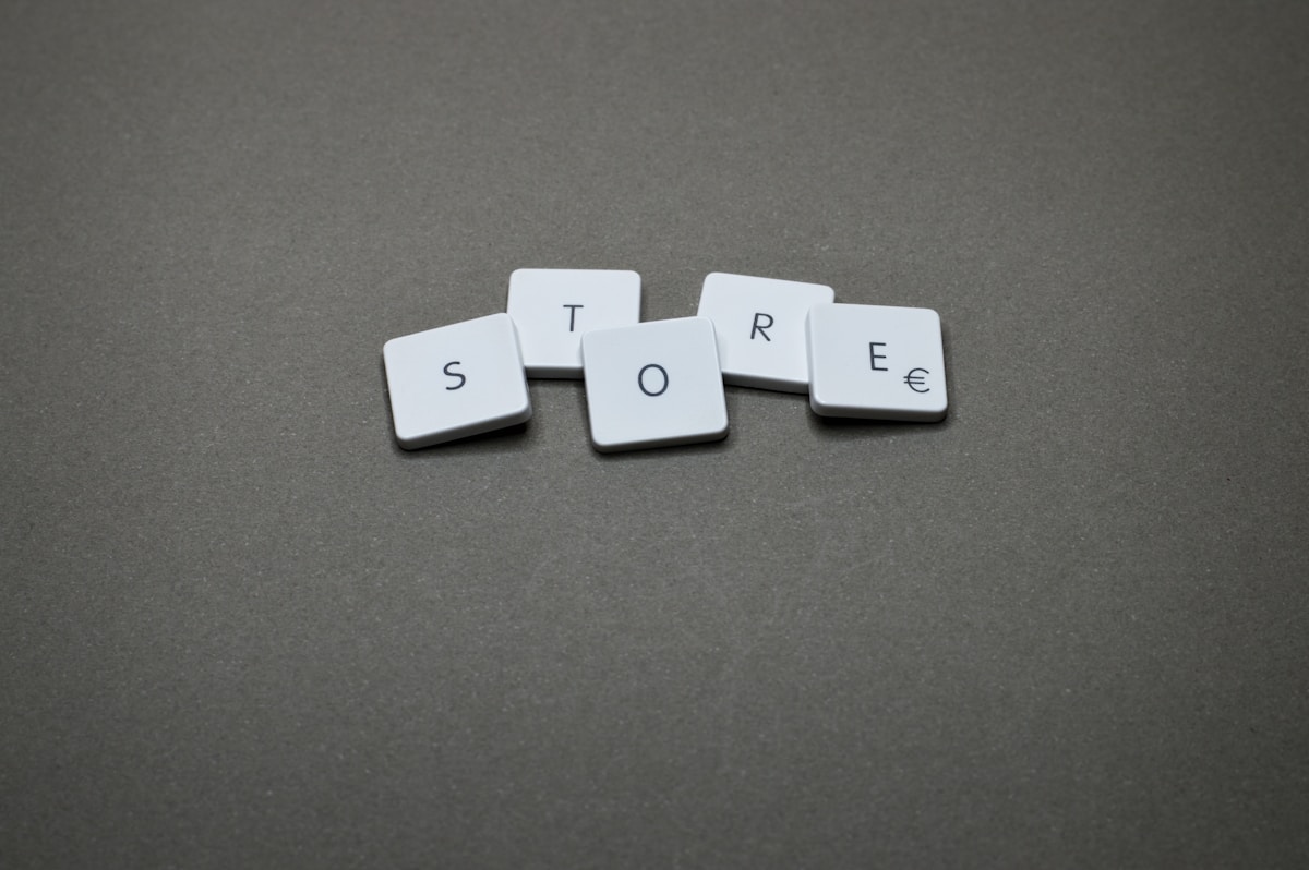 The word "store" is spelled with tiles.