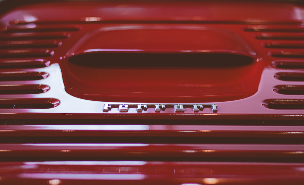 red Ferrari vehicle
