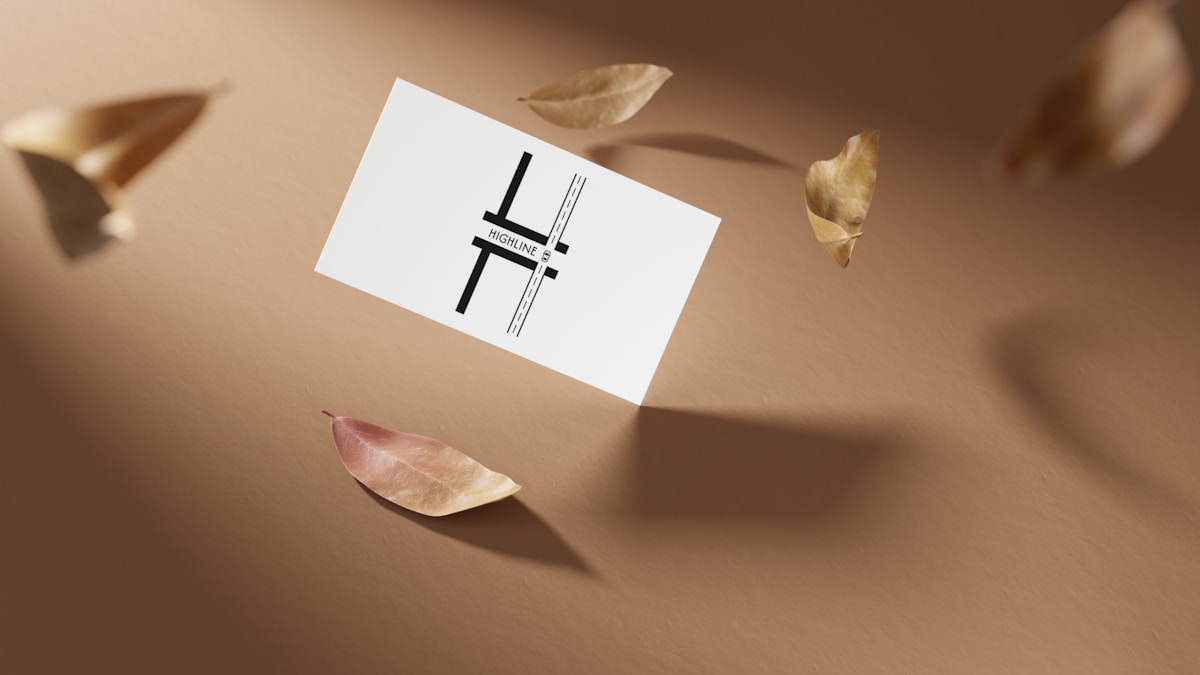 Carte de visite blanche avec logo graphique noir et texte "Highline".